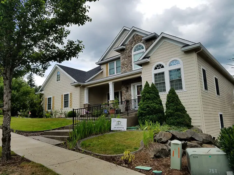 Two-story Clark County home repainted and re-sided by a siding contractor Camas WA homeowners recommend