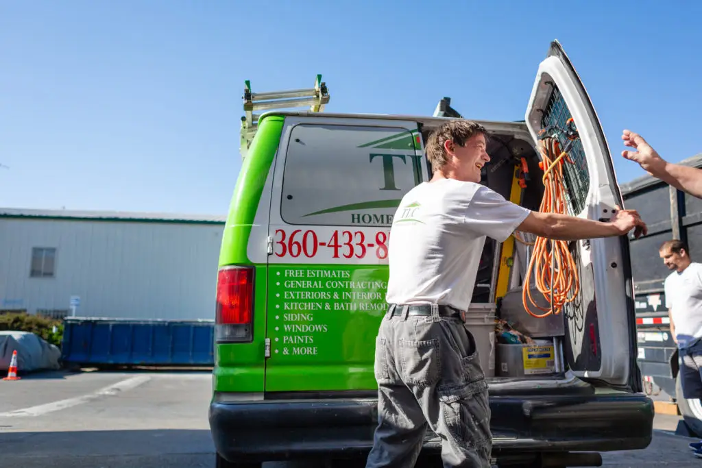 TLC Home Solutions work van at a Clark County job site — Camas WA remodeling contractor