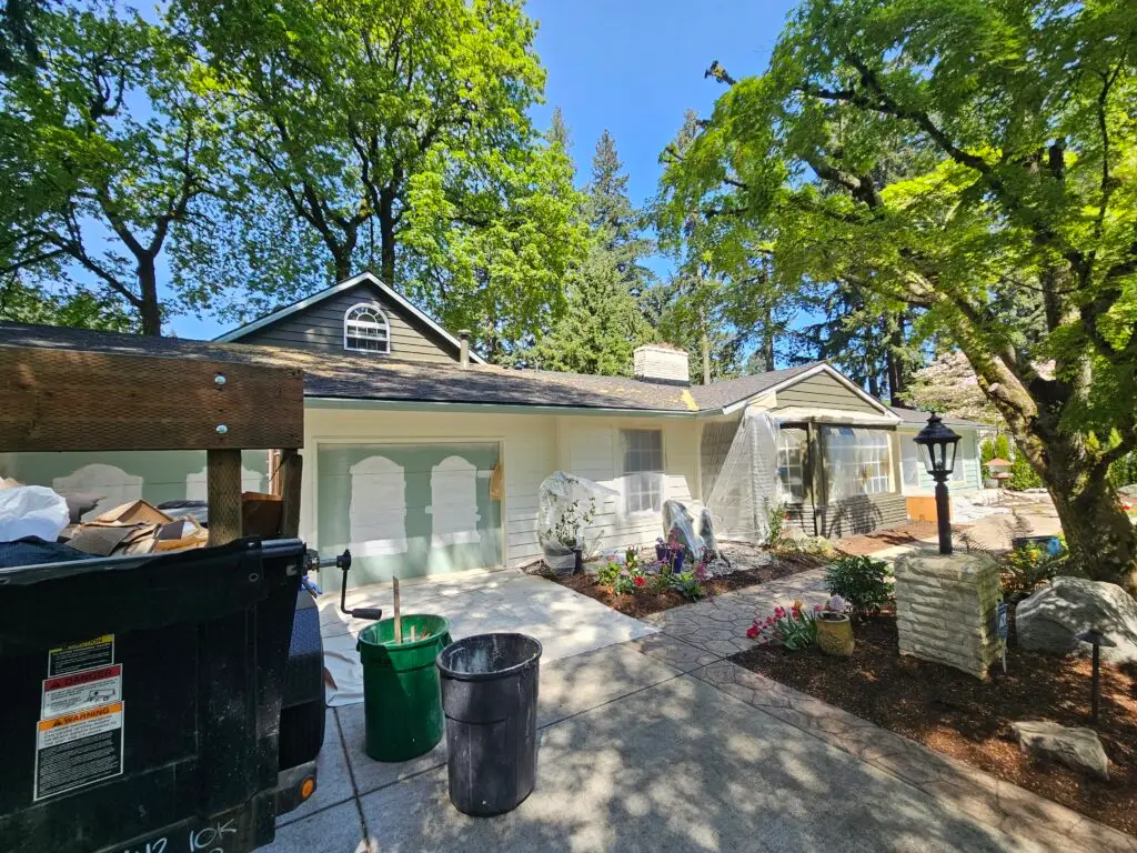 Exterior home renovation in progress in Clark County with siding removed
